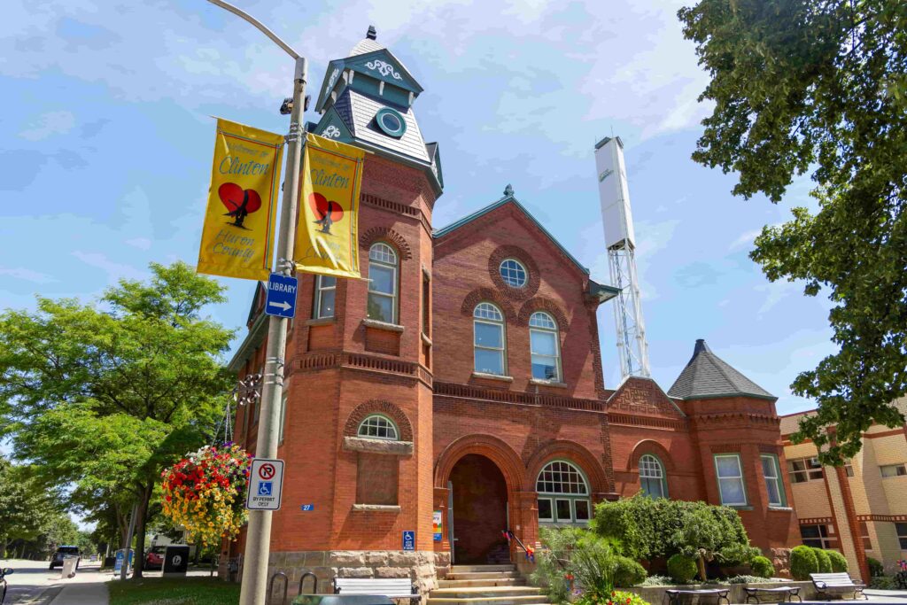 he Clinton Public Library in Central Huron, Ontario, featuring its historic brick architecture. A wheelchair accessible travel stop for visitors exploring the town.