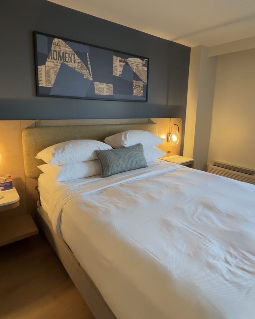 Queen bed with an adjustable base in the wheelchair accessible harbour view room at Delta Hotels Halifax in Nova Scotia, Canada
